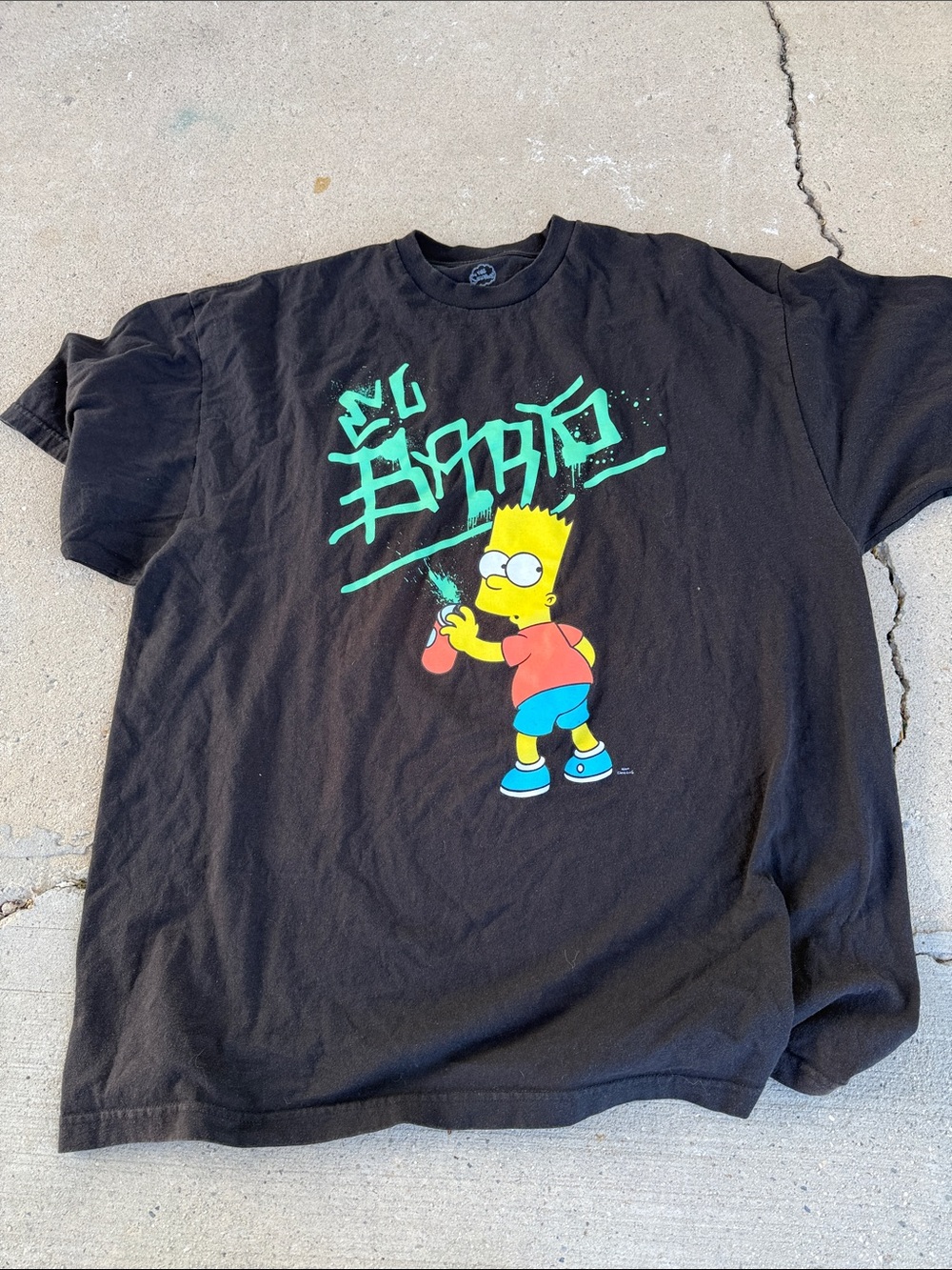 The Classic Black T-Shirt with Teal Graphic